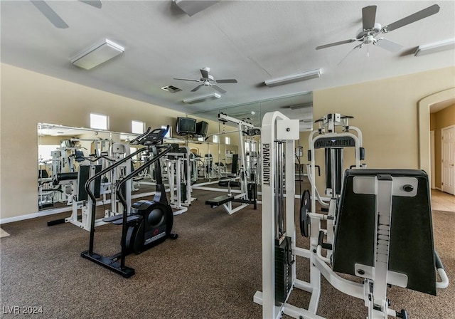 workout area with ceiling fan