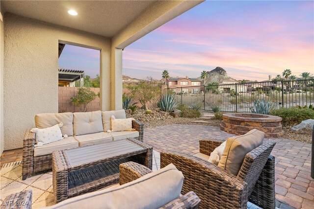 patio terrace at dusk with outdoor lounge area