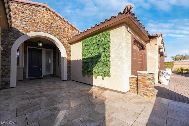 property entrance featuring a garage