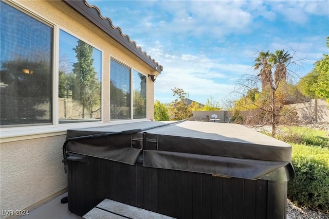 view of patio with a hot tub