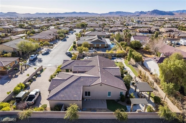 drone / aerial view featuring a mountain view