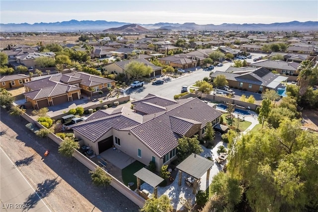 bird's eye view with a mountain view