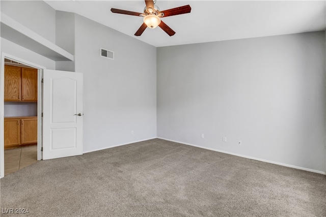 empty room with carpet and ceiling fan