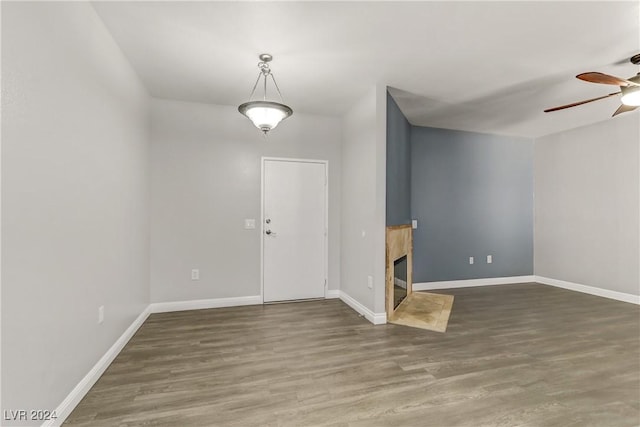 entryway featuring ceiling fan and hardwood / wood-style flooring