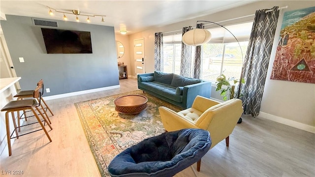 living room with light hardwood / wood-style floors