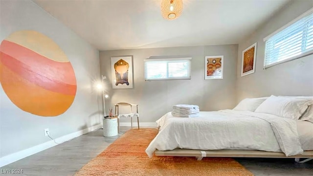 bedroom featuring hardwood / wood-style floors