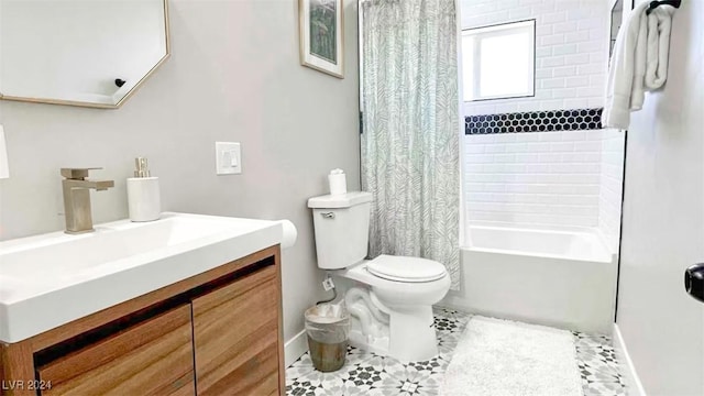 full bathroom featuring tile patterned flooring, shower / tub combo, vanity, and toilet