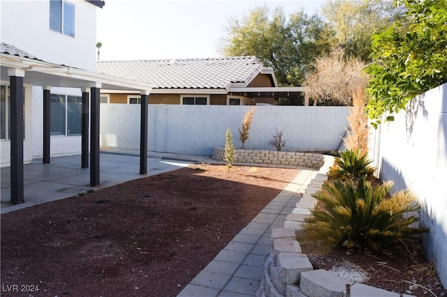 view of yard with a patio area