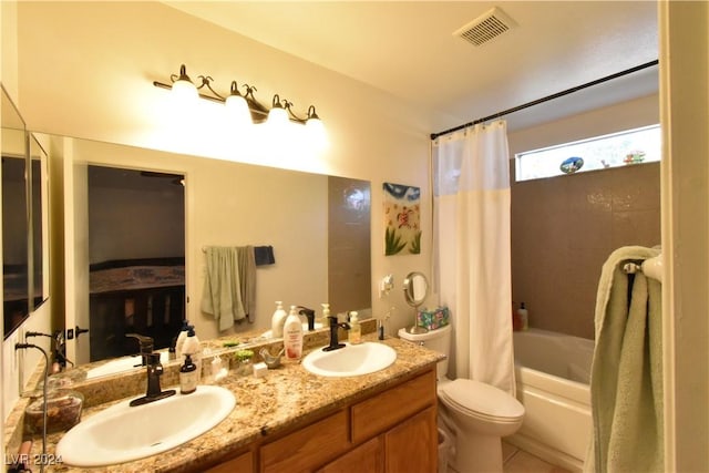 full bathroom featuring tile patterned flooring, vanity, toilet, and shower / bathtub combination with curtain