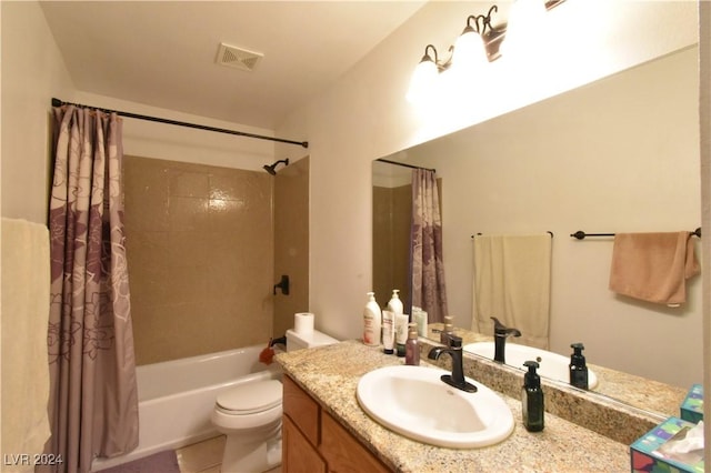 full bathroom featuring tile patterned floors, vanity, shower / bath combo, and toilet