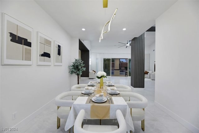 tiled dining room with ceiling fan