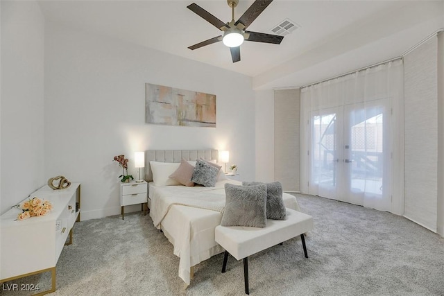 bedroom featuring french doors, access to outside, ceiling fan, and light colored carpet