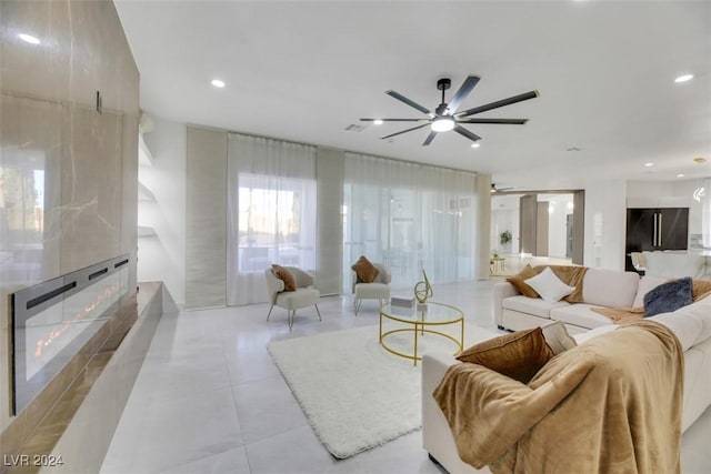 living room featuring ceiling fan