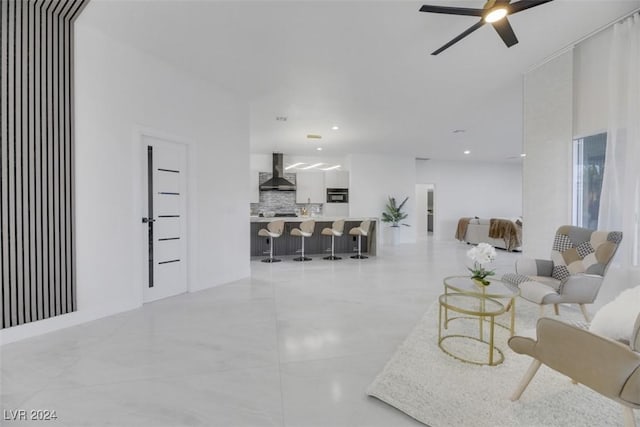 living room with ceiling fan