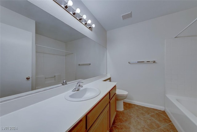 full bathroom featuring tile patterned flooring, bathtub / shower combination, vanity, and toilet