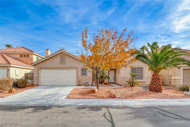 view of front of property featuring a garage