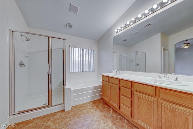 bathroom featuring vanity, lofted ceiling, tile patterned flooring, ceiling fan, and shower with separate bathtub