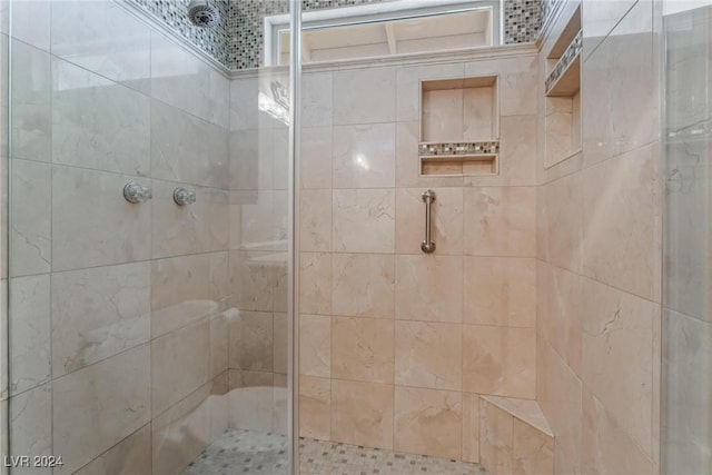 bathroom with an enclosed shower