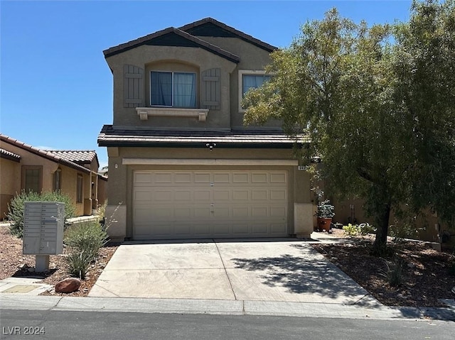 view of property featuring a garage