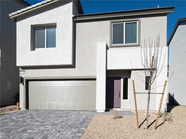 view of front of house with a garage