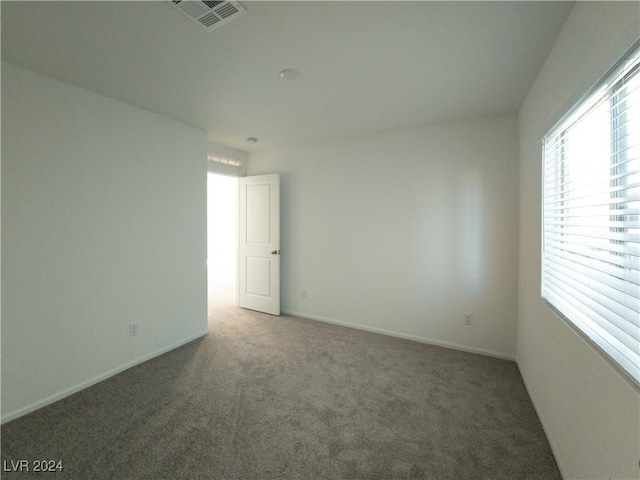 view of carpeted spare room