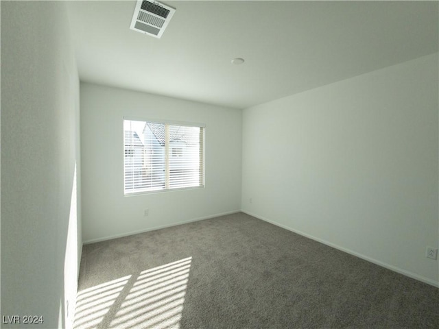 unfurnished room with carpet