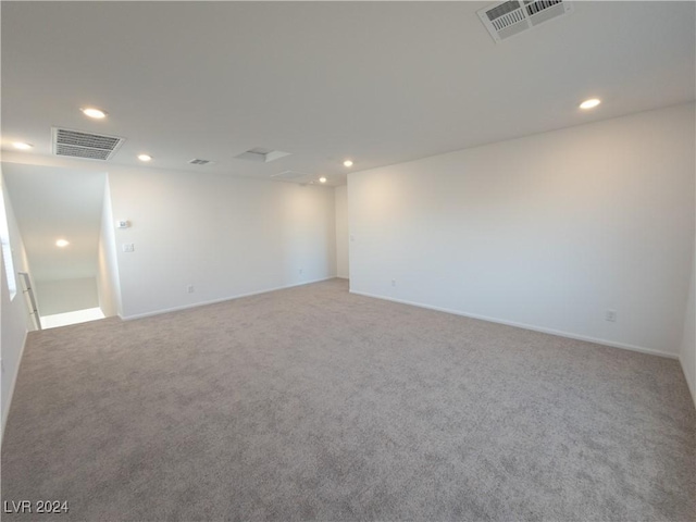 spare room featuring carpet flooring