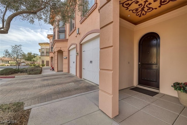 entrance to property with a garage