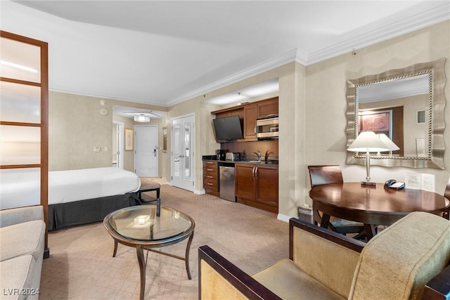 carpeted living room with ornamental molding and sink