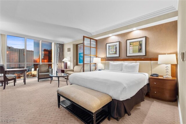 135 E Harmon Ave Unit 407, Las Vegas, NV 89109 - bedroom with light colored carpet and ornamental molding