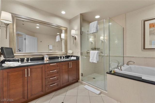 bathroom with vanity, tile patterned floors, and independent shower and bath