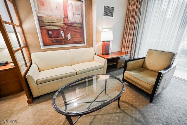 135 E Harmon Ave Unit 407, Las Vegas, NV 89109 - sitting room featuring tile patterned floors and visible vents