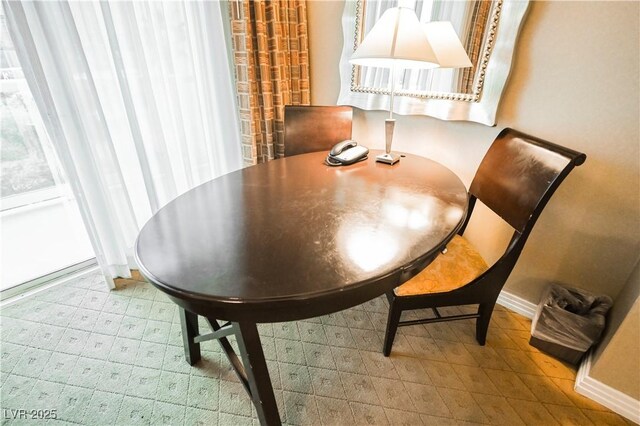 135 E Harmon Ave Unit 407, Las Vegas, NV 89109 - dining room with baseboards