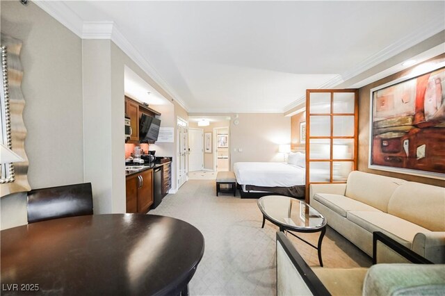 135 E Harmon Ave Unit 407, Las Vegas, NV 89109 - living area with carpet floors and crown molding