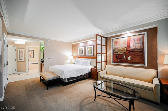 135 E Harmon Ave Unit 407, Las Vegas, NV 89109 - bedroom with carpet floors and crown molding