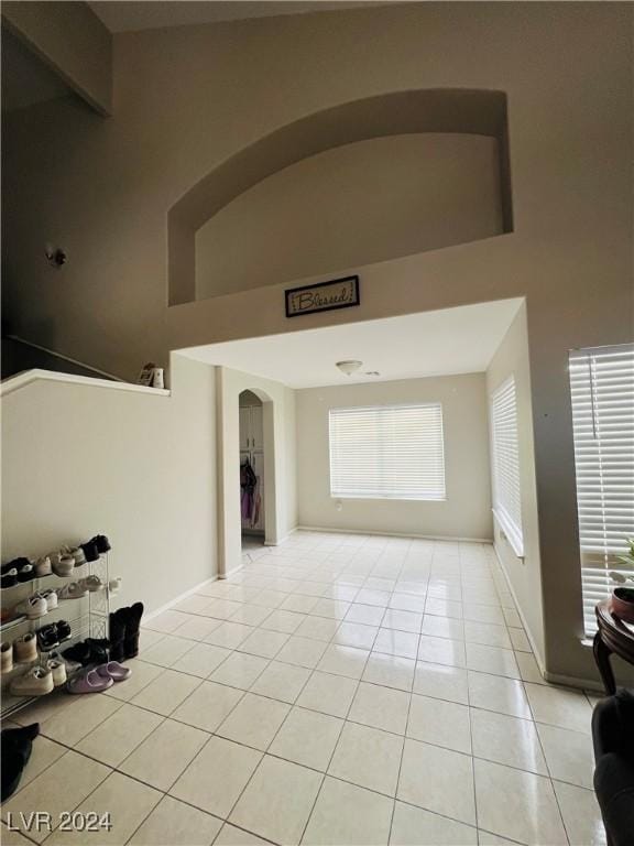 living room with light tile patterned flooring