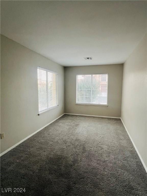 empty room featuring carpet