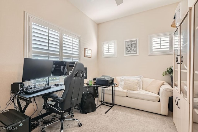 home office featuring light colored carpet and plenty of natural light