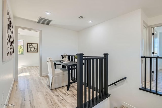 hall featuring light hardwood / wood-style flooring