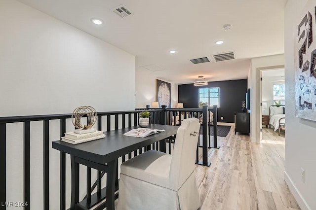 dining room with light hardwood / wood-style flooring