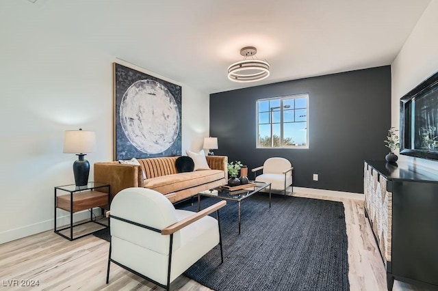 sitting room with light hardwood / wood-style floors