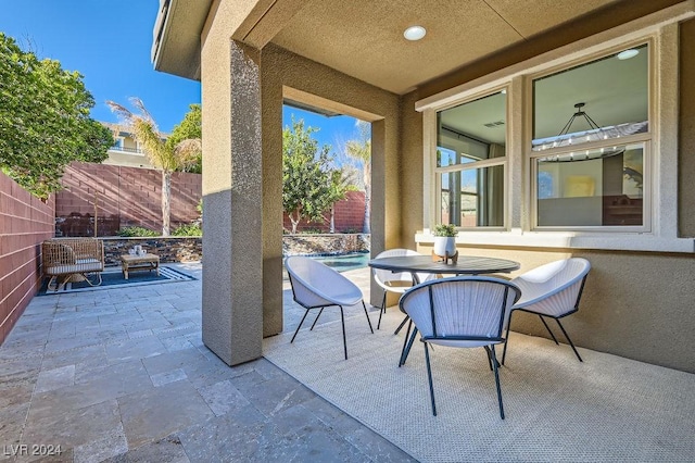 5873 Skyfall Ct, Las Vegas, NV 89135 - fenced backyard featuring a patio area