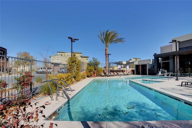 view of pool featuring a patio area