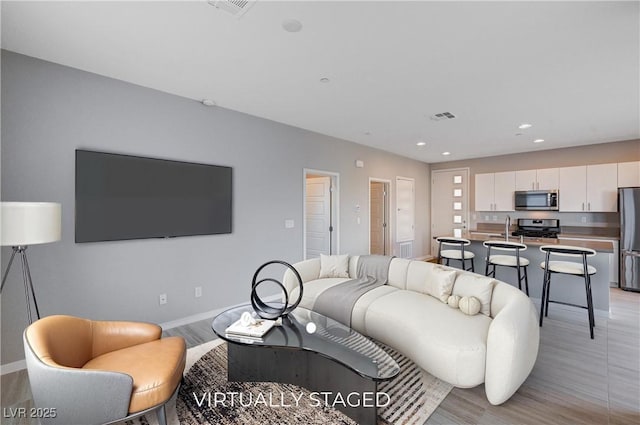 living room with light wood-type flooring