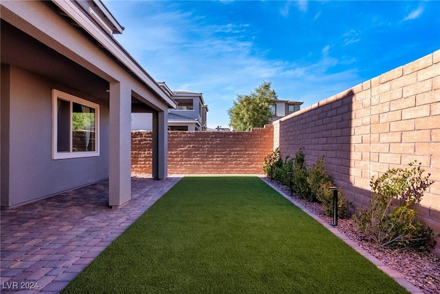 view of yard with a patio area