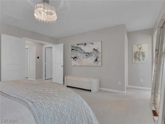 bedroom with light colored carpet and an inviting chandelier