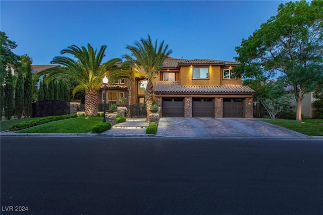 mediterranean / spanish-style home featuring a garage