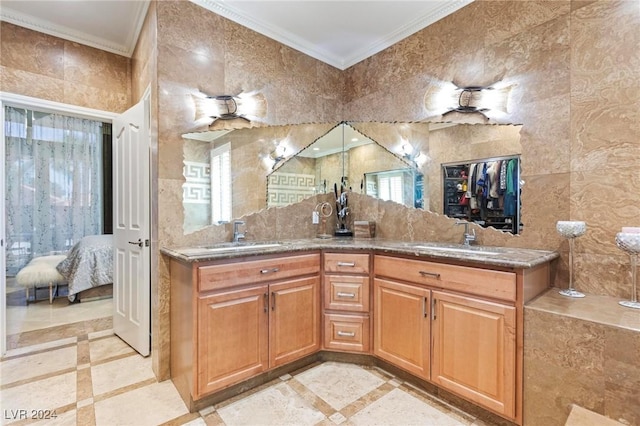 kitchen with kitchen peninsula, crown molding, and sink