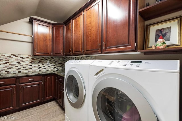 laundry area with cabinets and independent washer and dryer