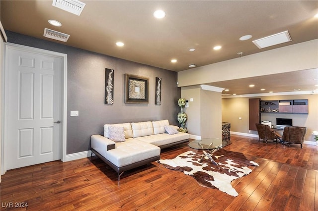 living room featuring dark hardwood / wood-style flooring